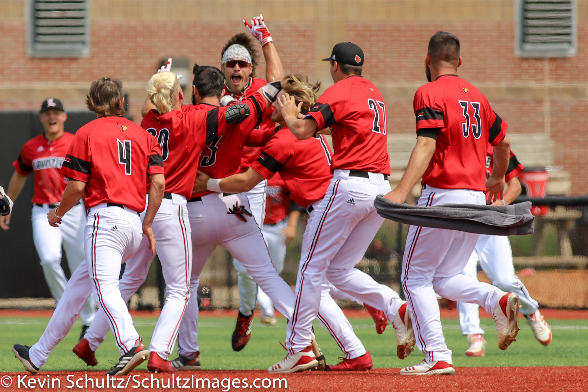 Louisville, KY, USA. 31st May, 2019. Nick Bennett of the Louisville  Cardinals celebrates a strikeout to end an inning in an NCAA Baseball  Regional at Jim Patterson Stadium in Louisville, KY. Kevin